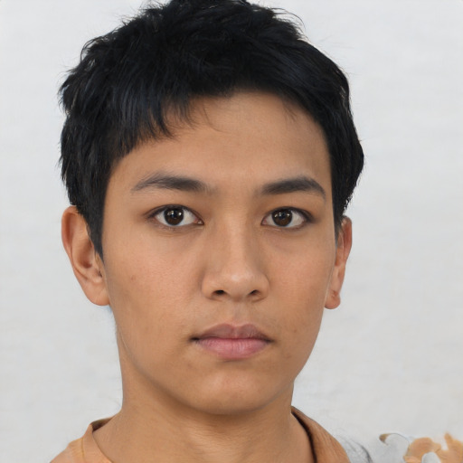 Neutral asian young-adult male with short  black hair and brown eyes
