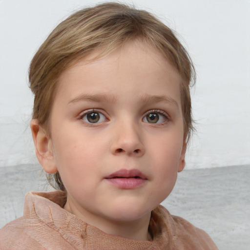 Neutral white child female with short  brown hair and blue eyes