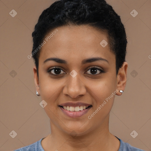 Joyful black young-adult female with short  brown hair and brown eyes