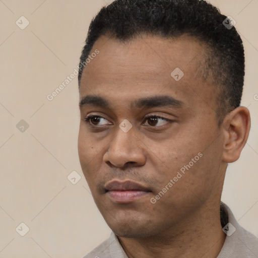 Neutral black young-adult male with short  black hair and brown eyes