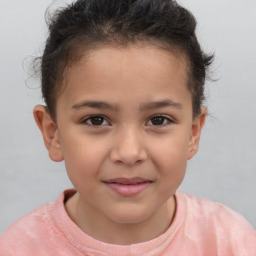 Joyful white child female with short  brown hair and brown eyes