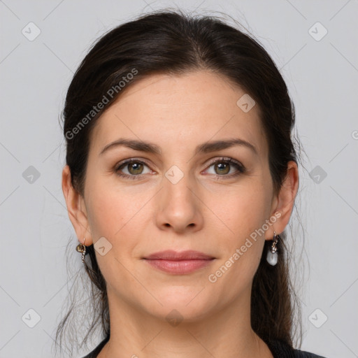 Joyful white young-adult female with long  brown hair and grey eyes