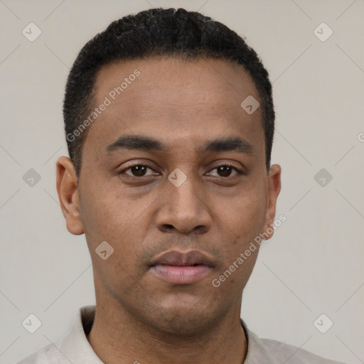 Neutral latino young-adult male with short  black hair and brown eyes