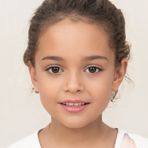 Joyful white child female with medium  brown hair and brown eyes