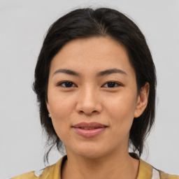 Joyful asian young-adult female with medium  brown hair and brown eyes