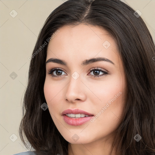 Neutral white young-adult female with long  brown hair and brown eyes