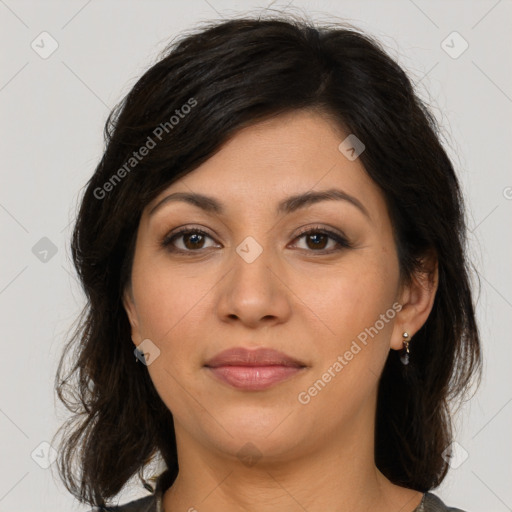 Joyful latino young-adult female with medium  brown hair and brown eyes