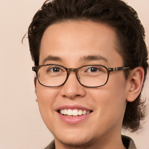 Joyful white young-adult male with medium  brown hair and brown eyes