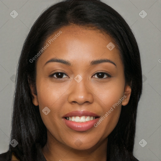 Joyful latino young-adult female with long  brown hair and brown eyes