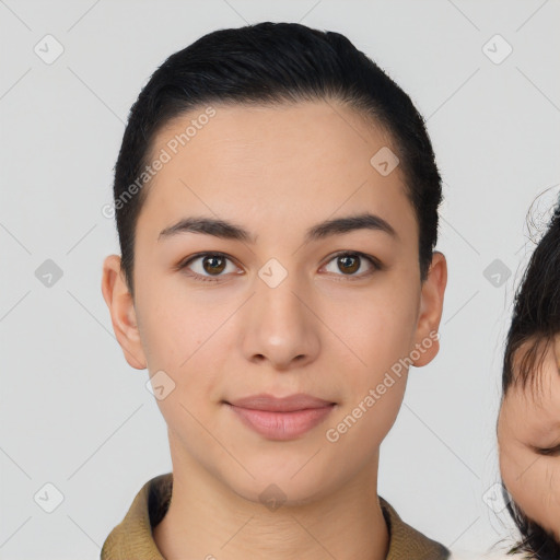 Joyful white young-adult female with short  black hair and brown eyes