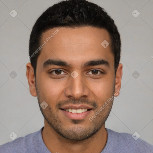 Joyful latino young-adult male with short  brown hair and brown eyes