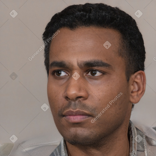 Neutral latino young-adult male with short  black hair and brown eyes