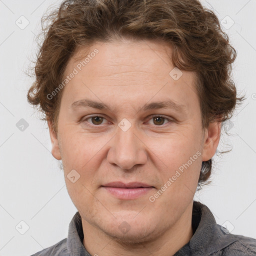 Joyful white adult female with short  brown hair and grey eyes