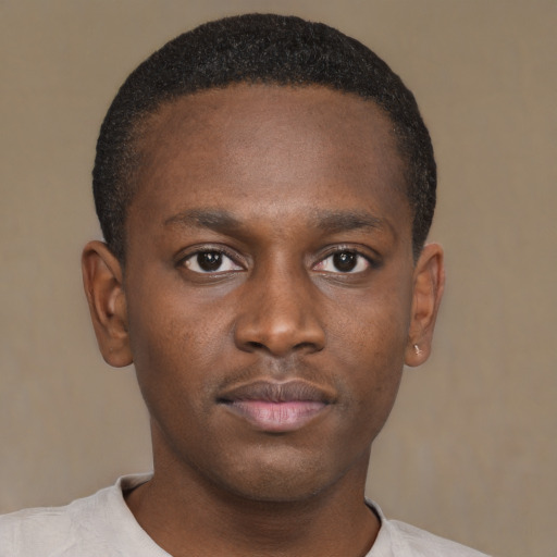 Neutral black young-adult male with short  brown hair and brown eyes