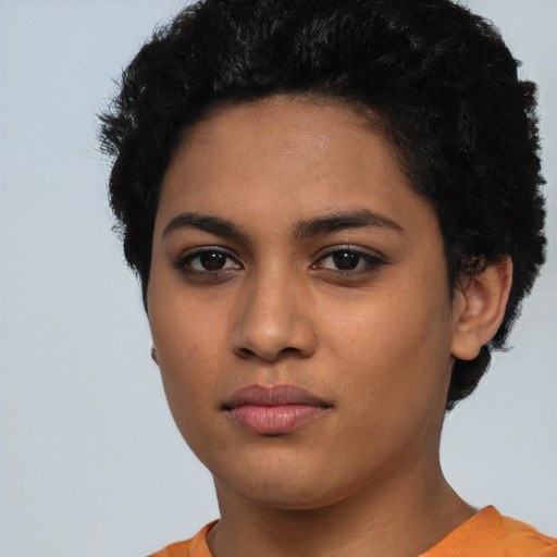 Neutral latino young-adult female with short  black hair and brown eyes