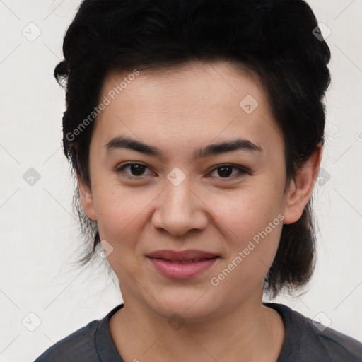 Joyful asian young-adult female with medium  black hair and brown eyes