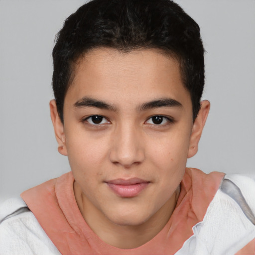 Joyful asian young-adult male with short  brown hair and brown eyes