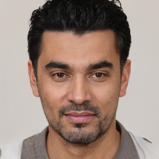 Neutral white young-adult male with short  black hair and brown eyes