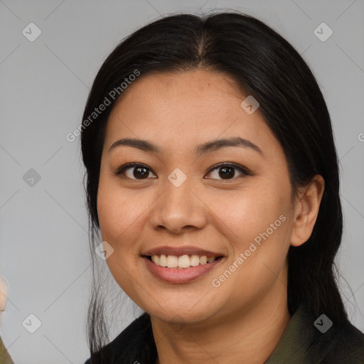 Joyful white young-adult female with long  black hair and brown eyes