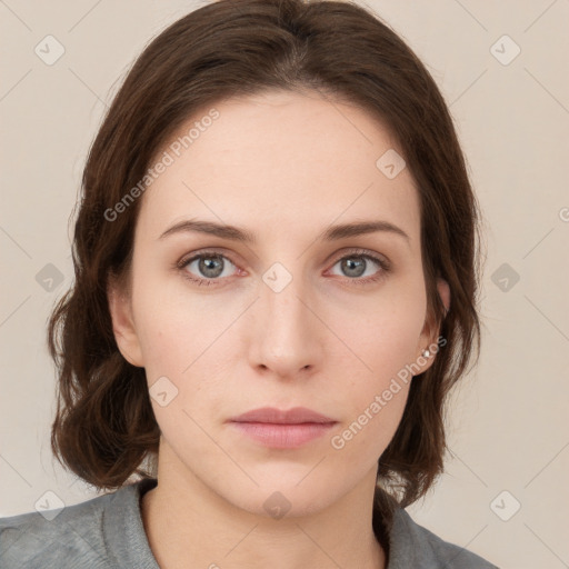 Neutral white young-adult female with medium  brown hair and grey eyes