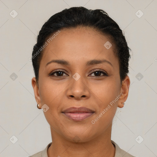 Joyful latino young-adult female with short  black hair and brown eyes