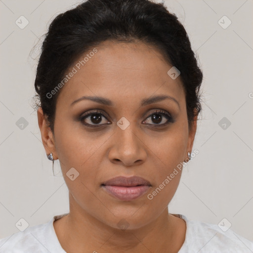 Joyful latino young-adult female with short  brown hair and brown eyes