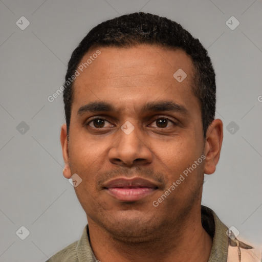 Joyful latino young-adult male with short  black hair and brown eyes