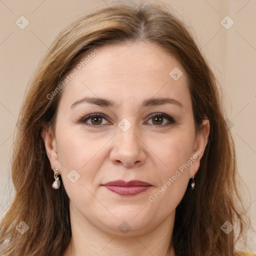 Joyful white adult female with long  brown hair and brown eyes