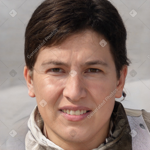 Joyful white adult female with short  brown hair and grey eyes