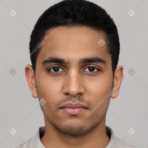 Neutral latino young-adult male with short  black hair and brown eyes