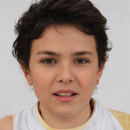 Joyful white child female with medium  brown hair and brown eyes