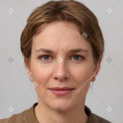 Joyful white adult female with medium  brown hair and grey eyes