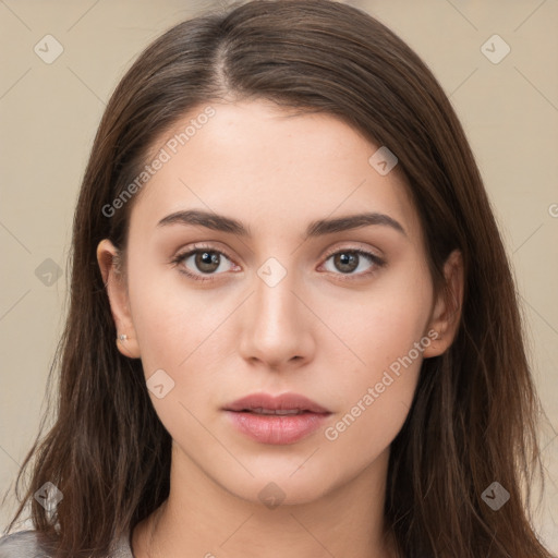 Neutral white young-adult female with long  brown hair and brown eyes