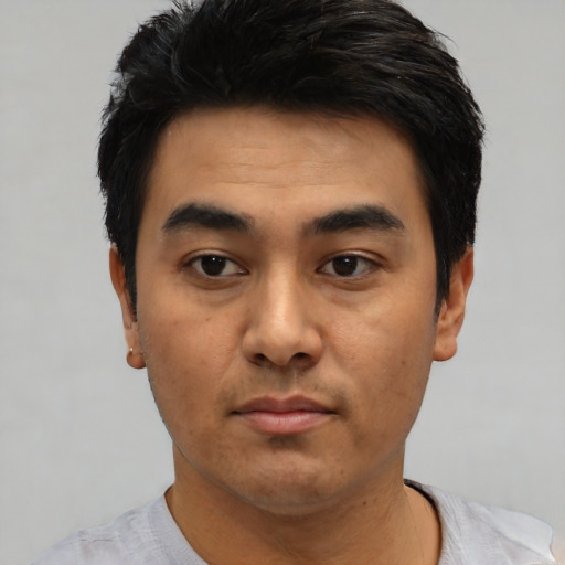 Neutral asian young-adult male with short  black hair and brown eyes