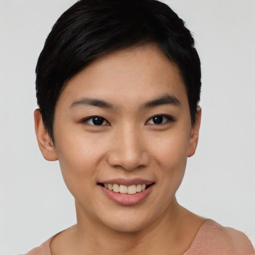 Joyful asian young-adult female with short  black hair and brown eyes