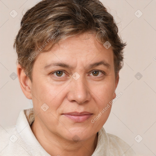 Joyful white adult female with short  brown hair and brown eyes