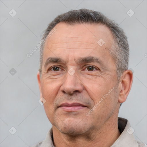 Neutral white middle-aged male with short  brown hair and brown eyes