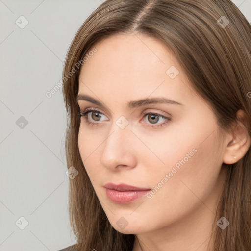 Neutral white young-adult female with long  brown hair and brown eyes