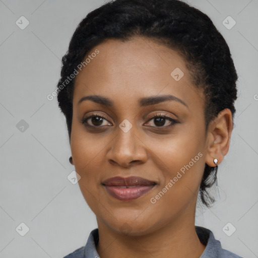 Joyful latino young-adult female with short  black hair and brown eyes