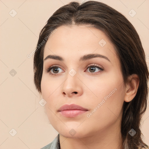 Neutral white young-adult female with medium  brown hair and brown eyes