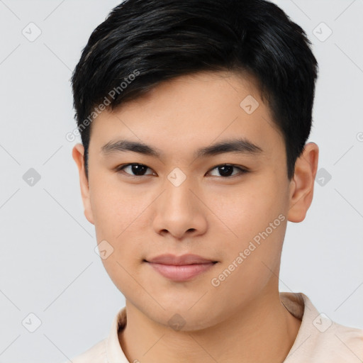 Joyful asian young-adult male with short  black hair and brown eyes