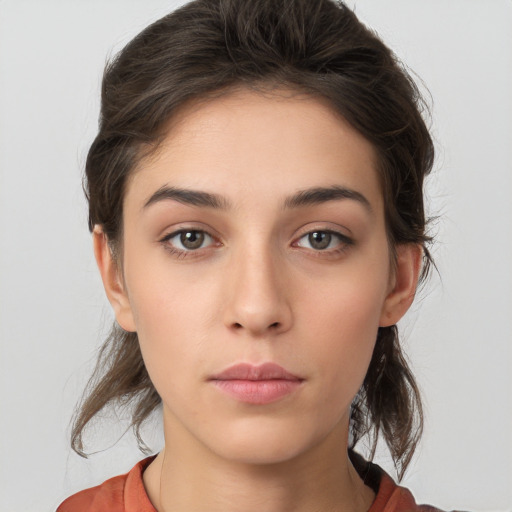 Neutral white young-adult female with medium  brown hair and brown eyes