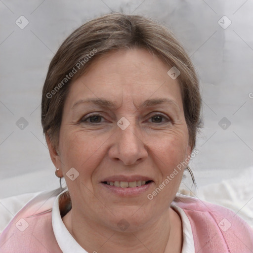 Joyful white adult female with short  brown hair and brown eyes