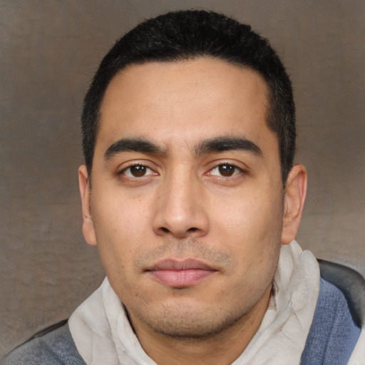 Neutral white young-adult male with short  black hair and brown eyes