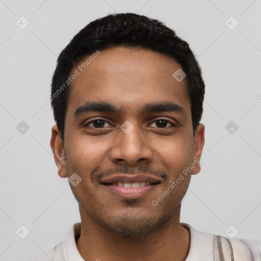 Joyful latino young-adult male with short  black hair and brown eyes