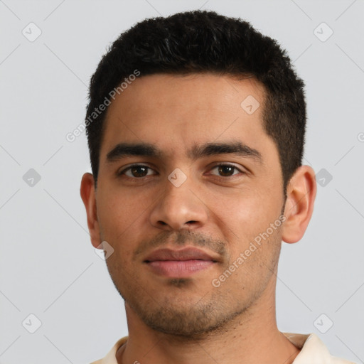 Neutral latino young-adult male with short  black hair and brown eyes