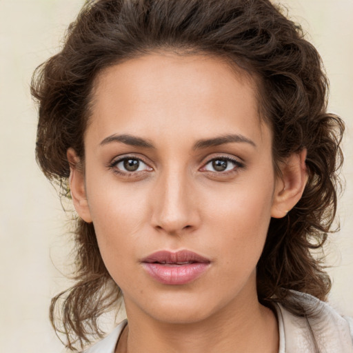 Neutral white young-adult female with medium  brown hair and brown eyes