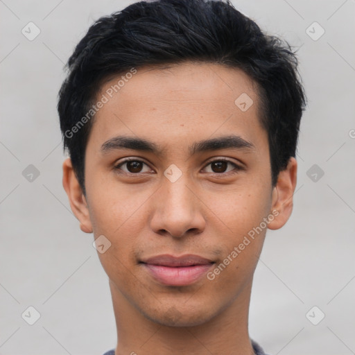 Joyful latino young-adult male with short  black hair and brown eyes