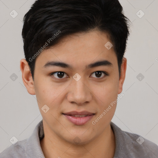 Joyful asian young-adult male with short  brown hair and brown eyes