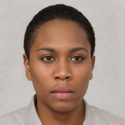 Neutral black young-adult female with short  black hair and brown eyes